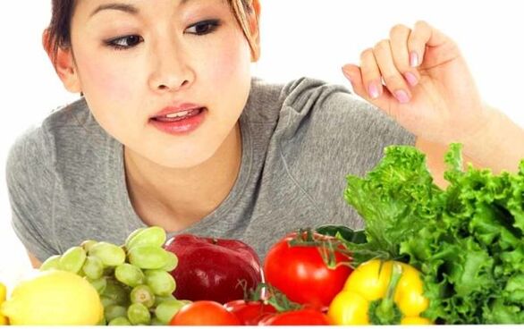 The Japanese girl chooses products for a diet