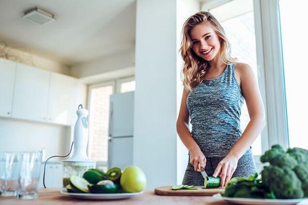 The girl prepares food according to the principles of diet No. 1 for gastritis