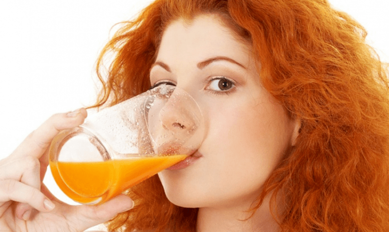 the girl drinks juice on a diet to drink